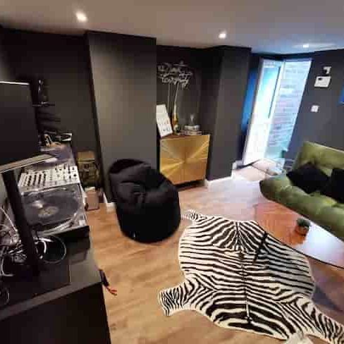 basement music studio conversion Leeds with professional equipment and lounge area