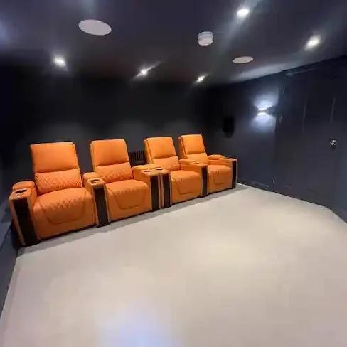 home cinema room basement conversion Roundhay Park Leeds with leather seating and recessed lighting